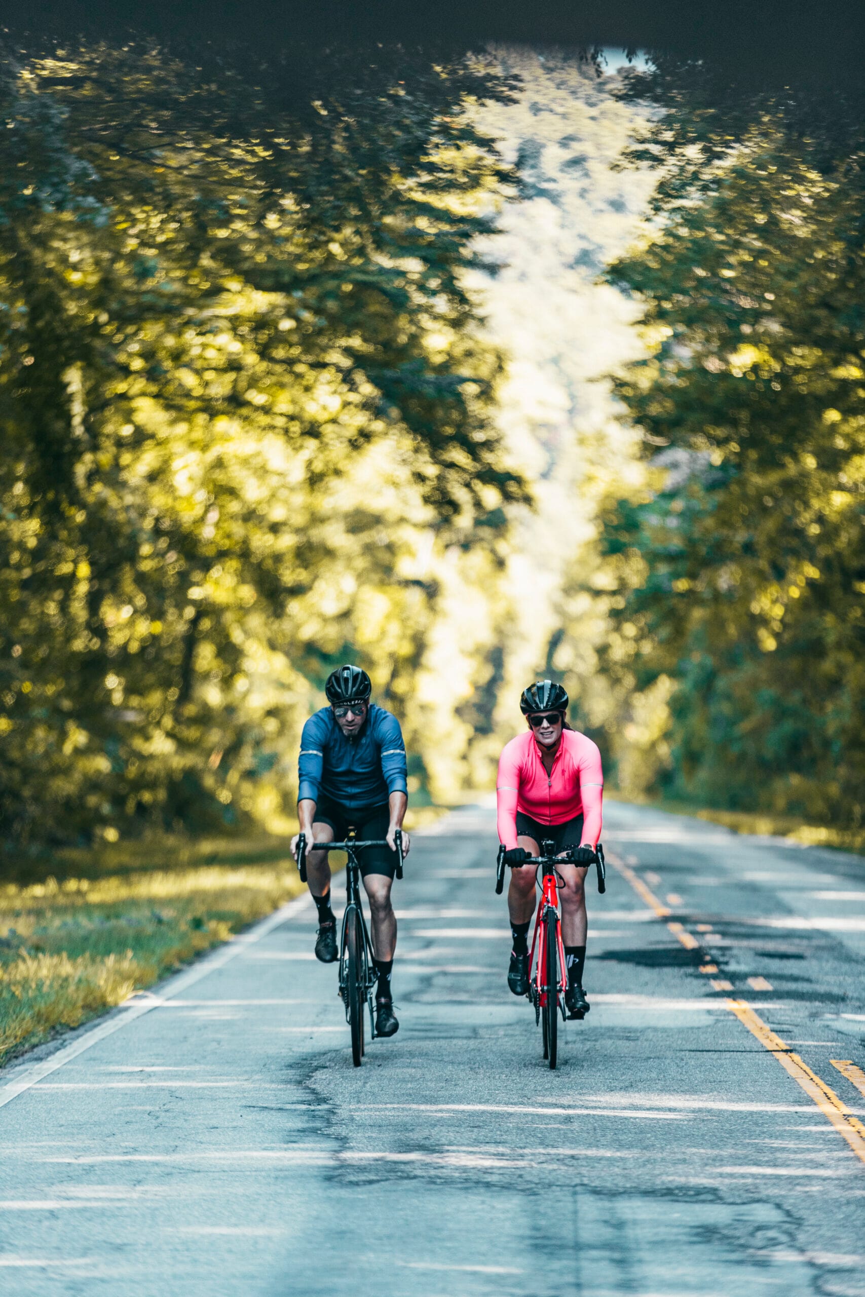 2 people riding bikes